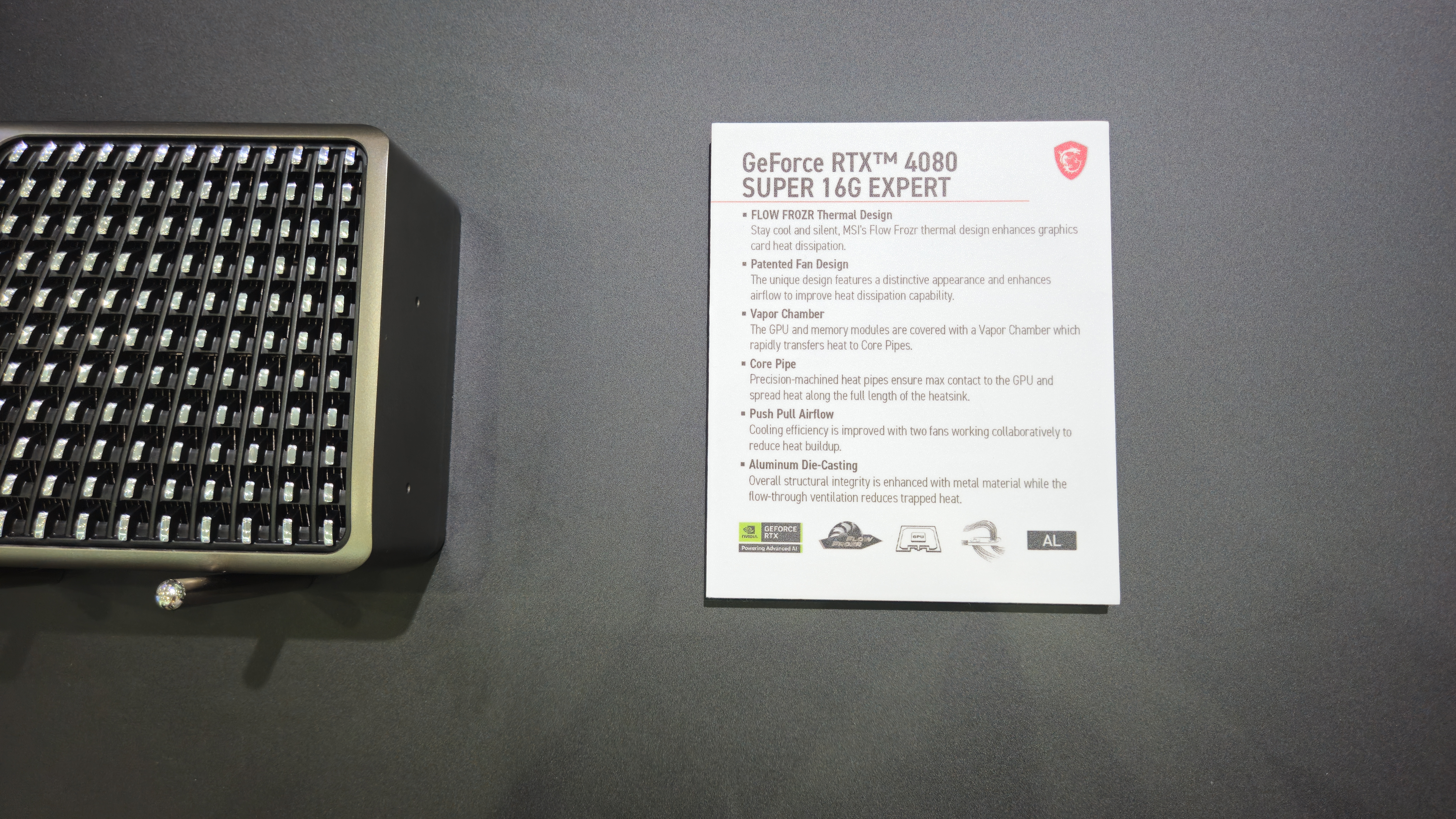 An MSI GeForce RTX Expert OC graphics card being displayed at Computex 2025