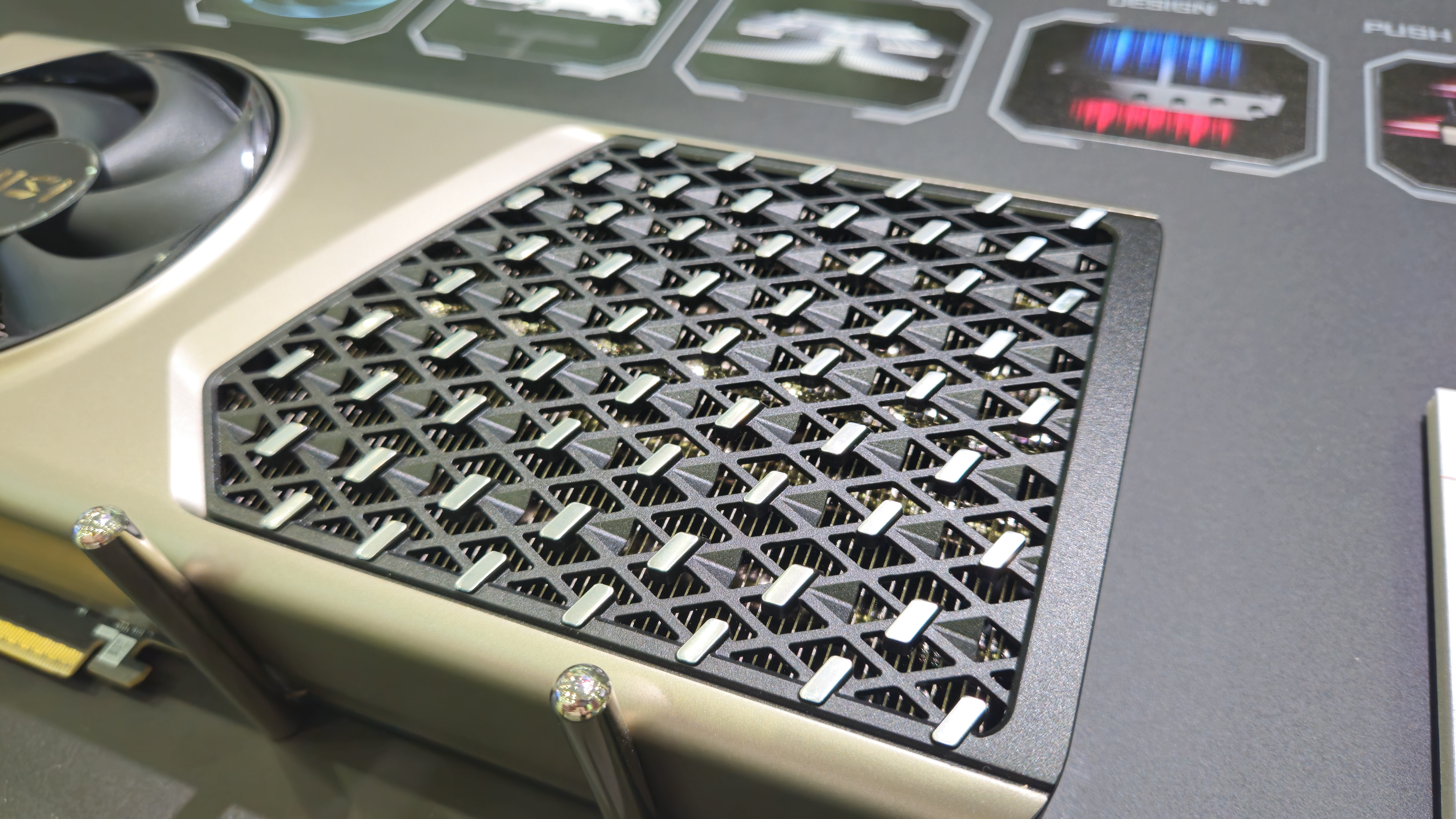 An MSI GeForce RTX Expert OC graphics card being displayed at Computex 2025