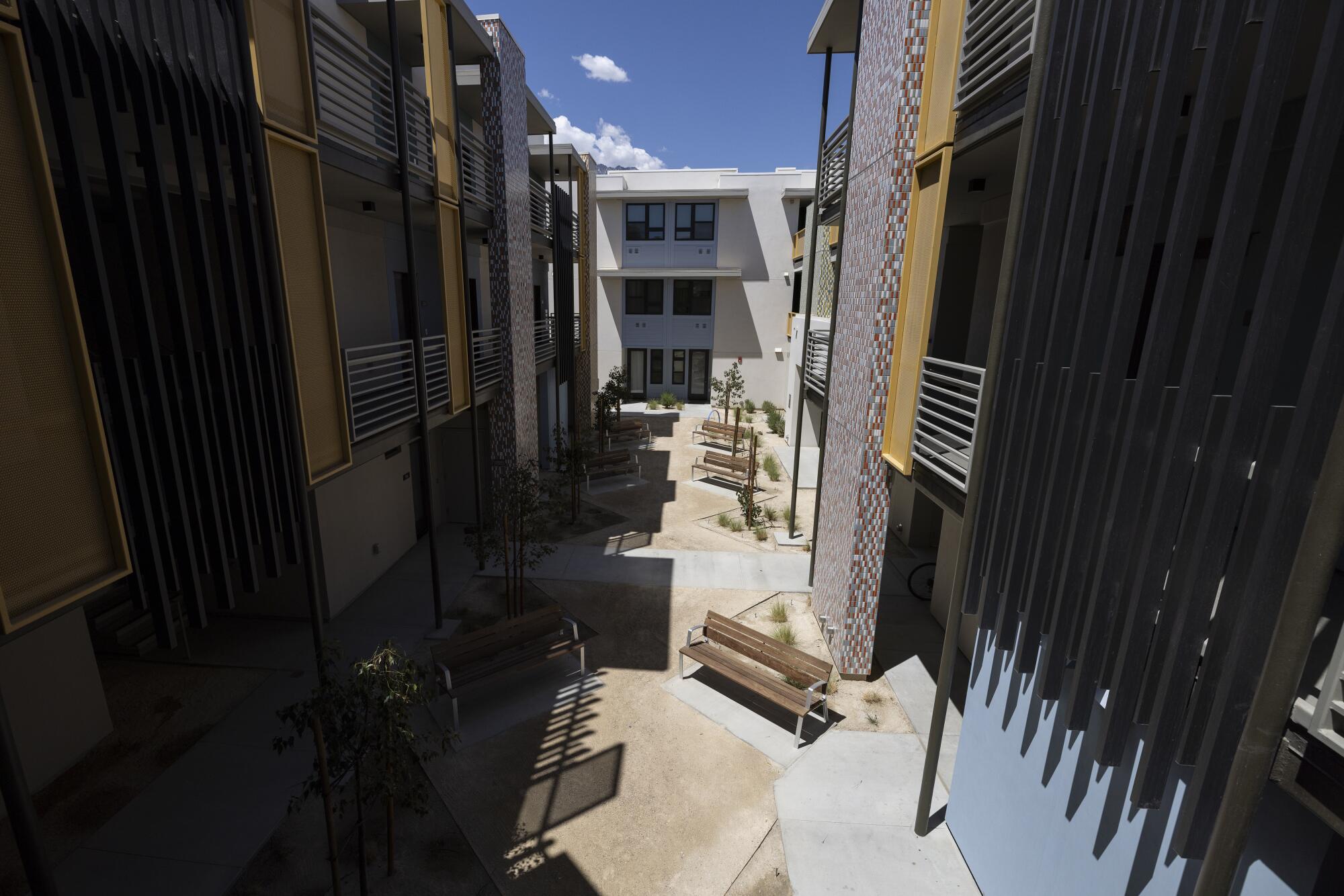 The sleek courtyard of an affordable housing complex in Palm Springs.