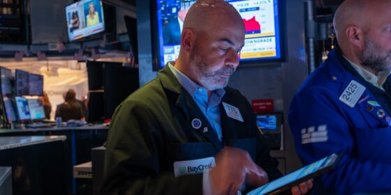 Stocks swing to a flat close as bond yields spike on U.S. debt worries