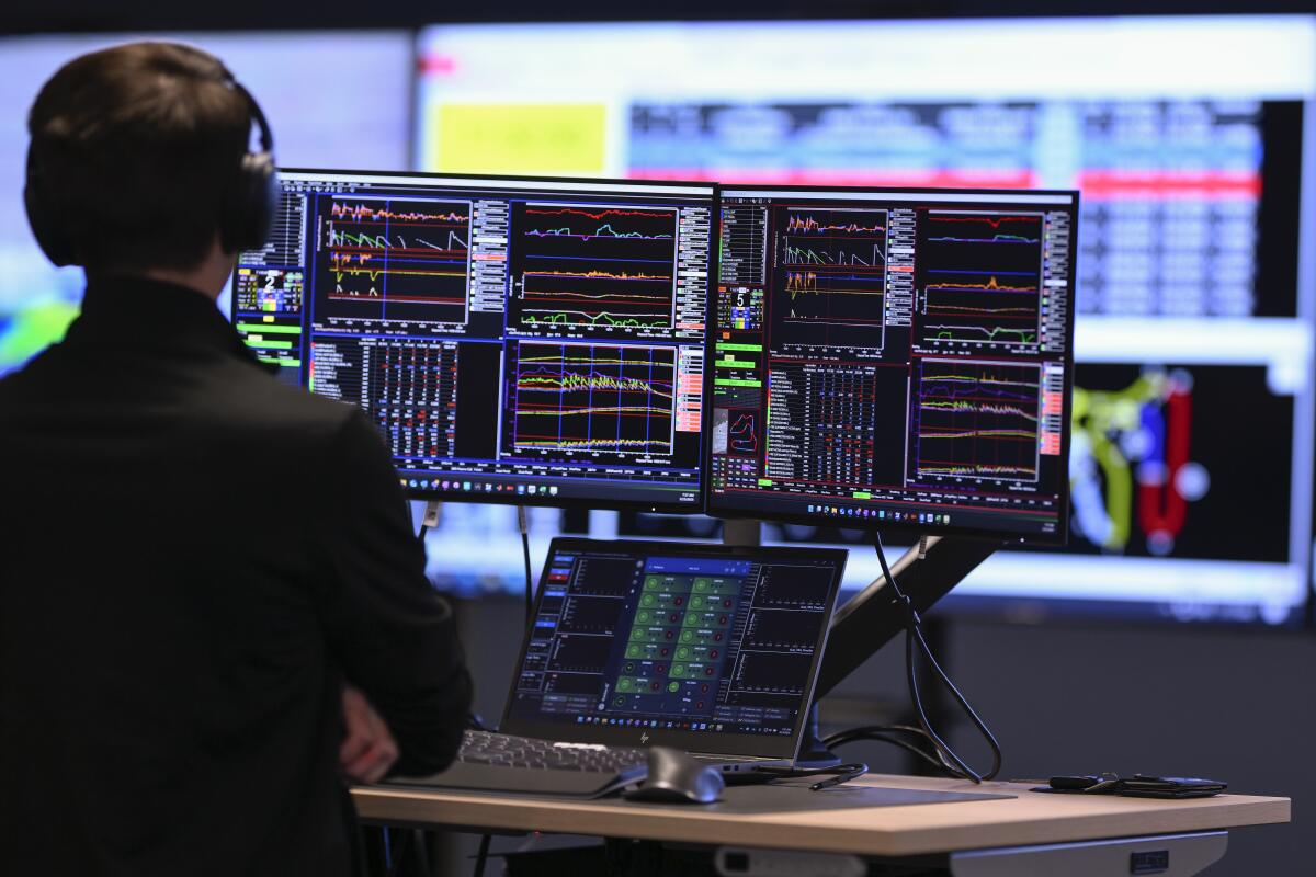 A engineer monitors telemetry remotely from HRC headquarters.