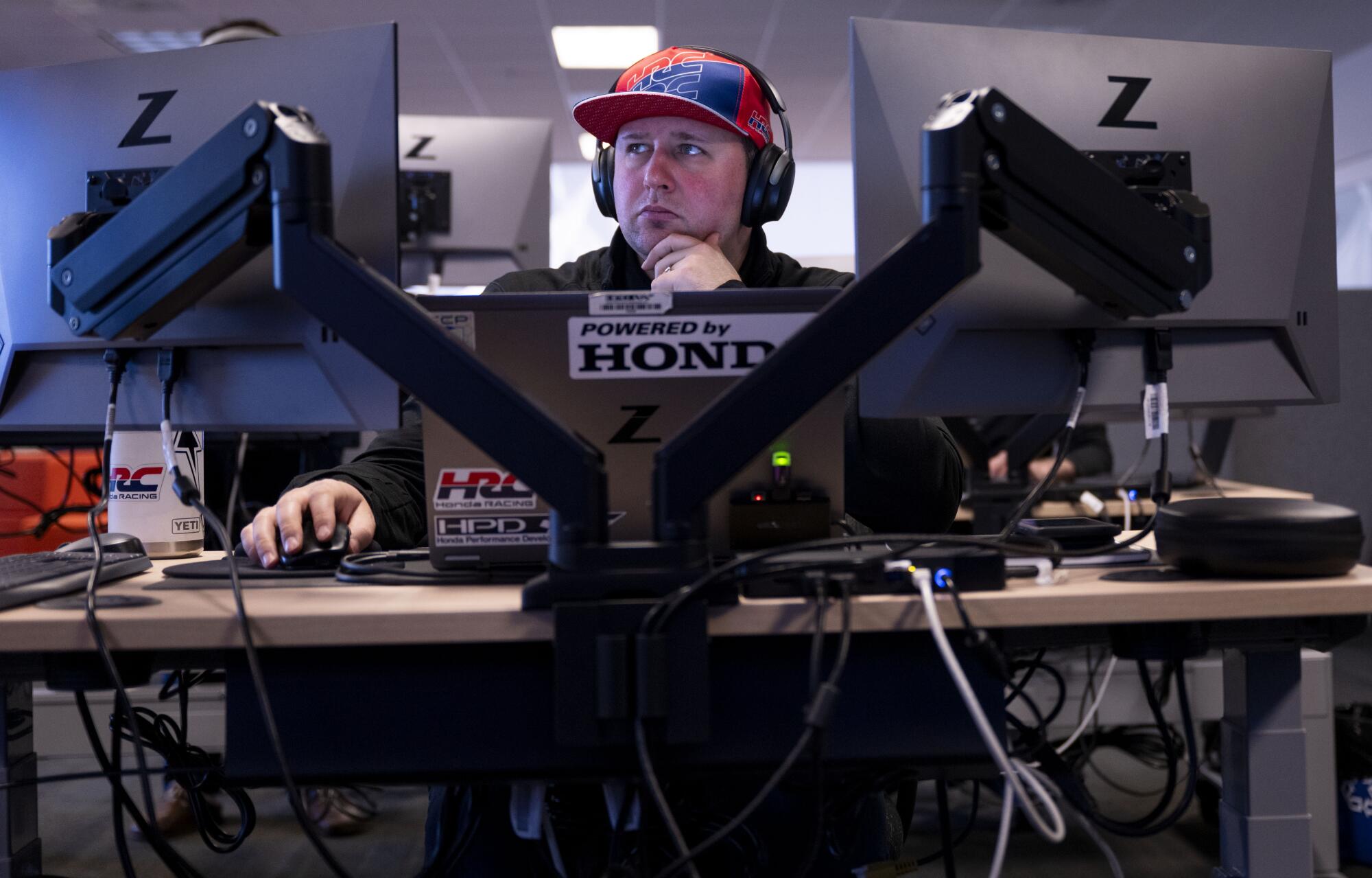 Honda powertain engineer Jake Marthaler monitors data during the 12 Hours of Sebring in March.