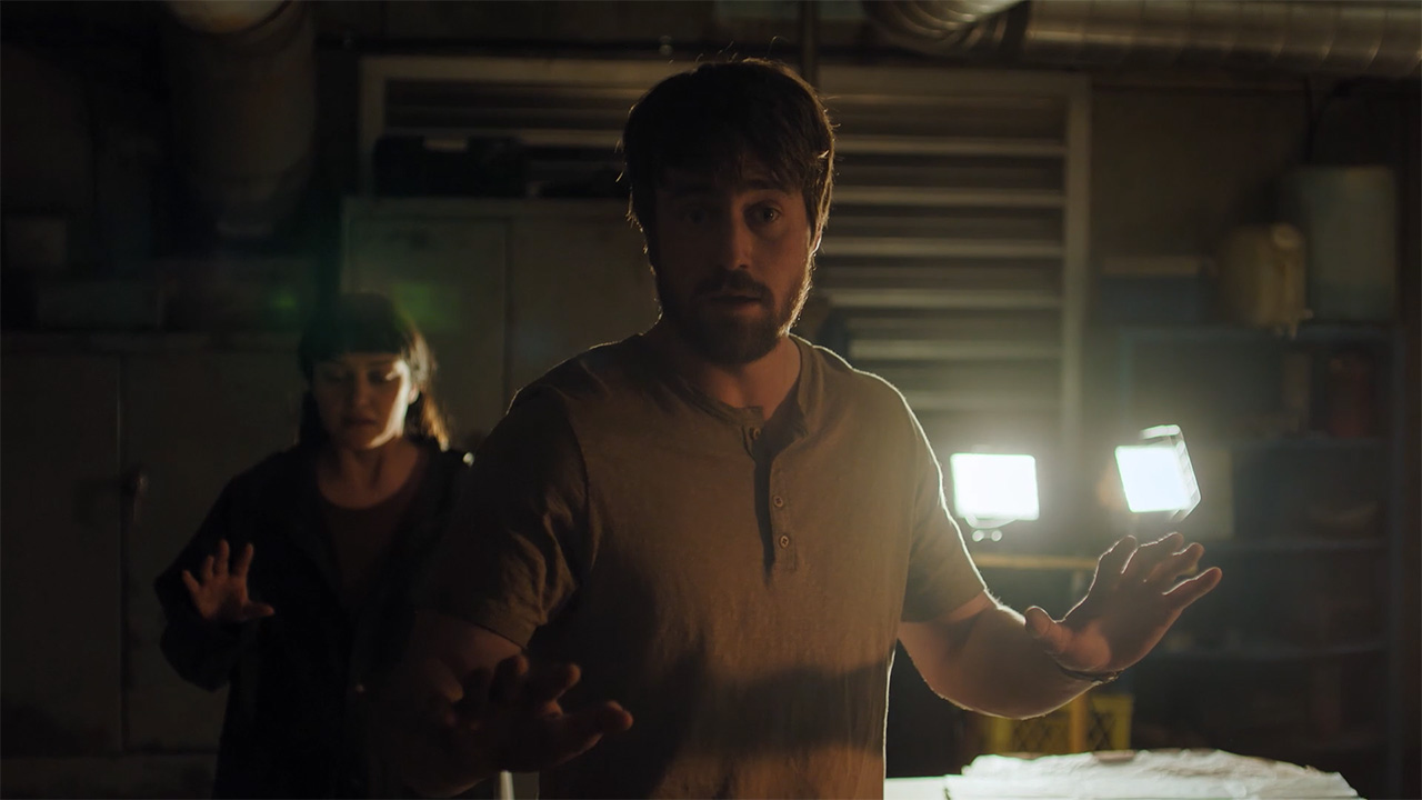 Mel and Owen holding up their hands in The Last of Us season 2 episode 7