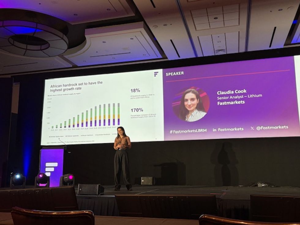 Cook speaks on stage at the Fastmarkets event.