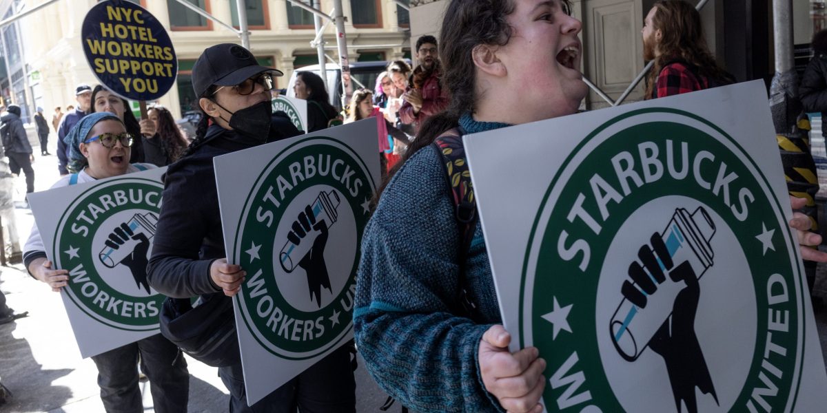 The next phase of Starbucks' turnaround plan is offering executives up to $6 million in stock grants, as baristas scrap to get annual raises above 2%