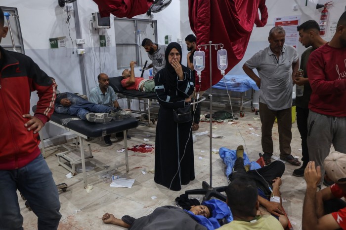 People injured by Israeli fire at a food distribution point set up by GHF