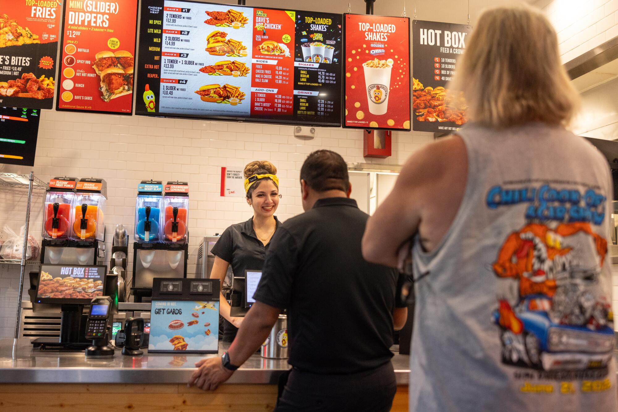 Customers order at the Northridge location of Dave's Hot Chicken in June.