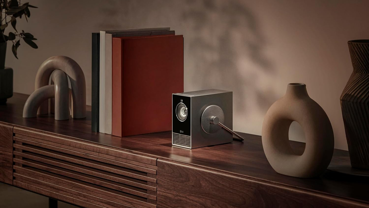 LG CineBeam Q HU710PB 4K Smart Portable Projector on shelf