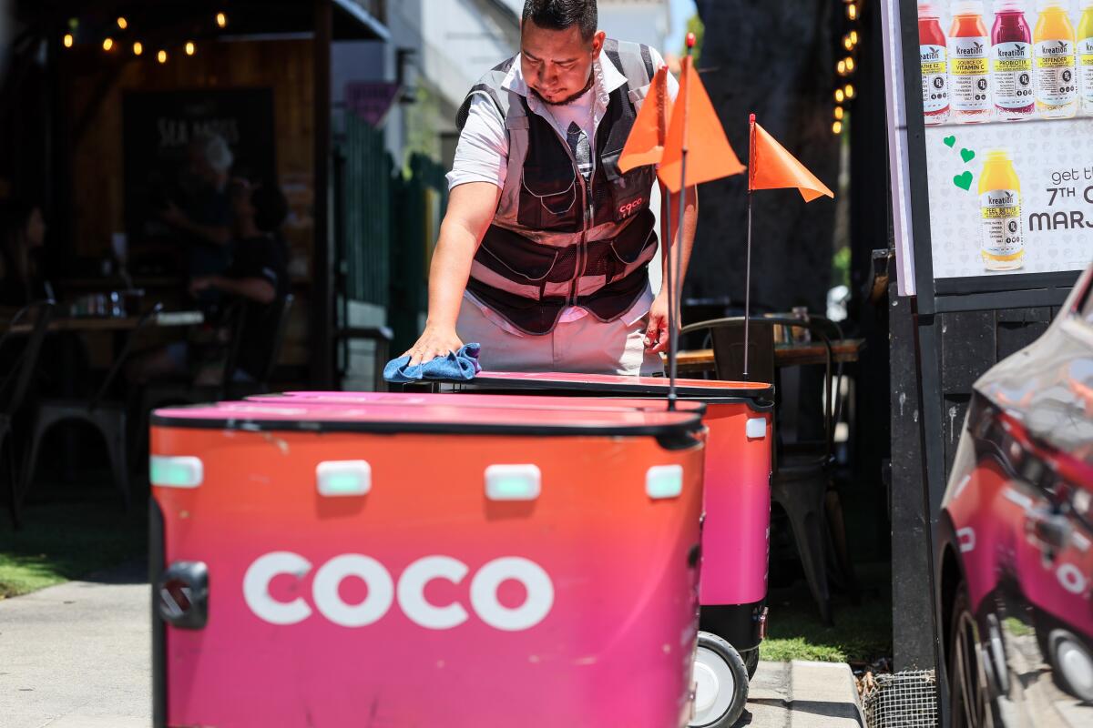 Coco Robotics food delivery robot technician Hugo Delgado services units.