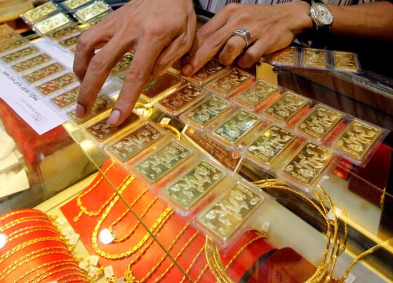 Gold prices hover near one-month high