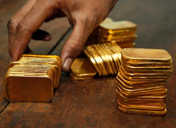 Gold slides as safe-haven demand eases