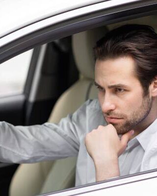 I'm 26 and recently came into K. I've got a K car loan — should I pay that off or invest all the money?