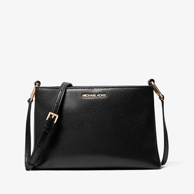 Michael Kors Outlet is selling a 'spacious' $398 crossbody bag for $79, and it's 'perfect for traveling'