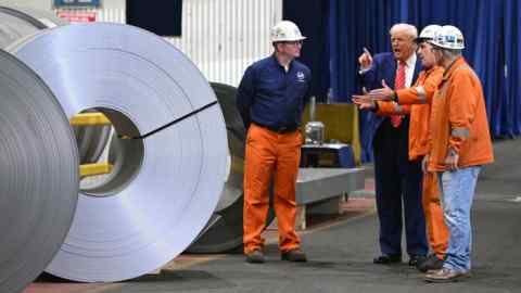 President Donald Trump, second left, tours a US Steel works in West Mifflin, Pennsylvania