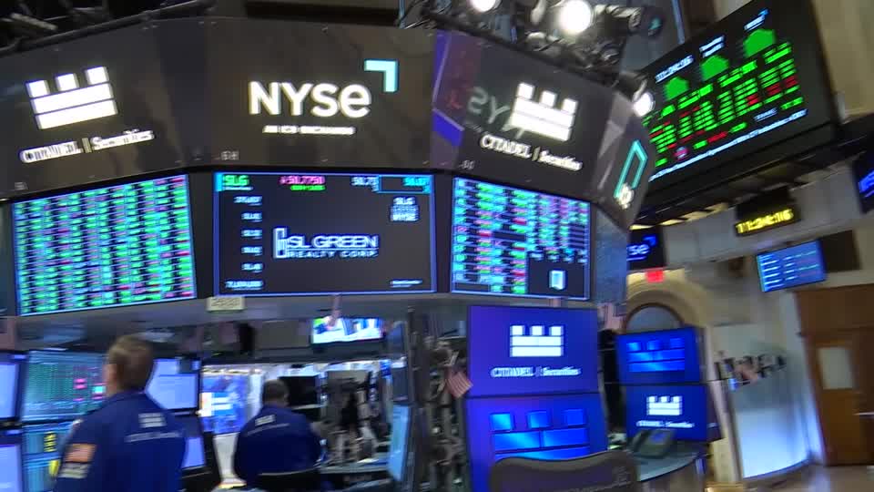 US stocks close lower as earnings weigh; Fed statement on tap