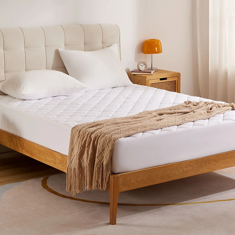 Walmart is selling a 'plush' $136 mattress protector for only $17, and shoppers say it's 'so comfy and soft'