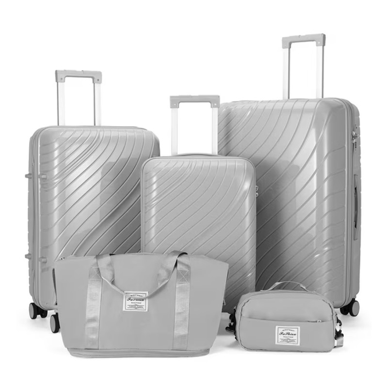 Walmart is selling a 'sturdy' $227 5-piece luggage set for $95 that shoppers say is 'easy to push around'