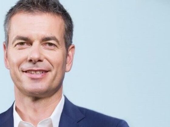 Warner Music Group announces layoffs, larger restructuring plan