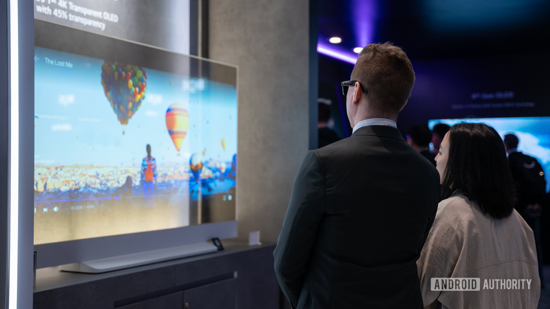 Darcy looking at LG transparent display 1