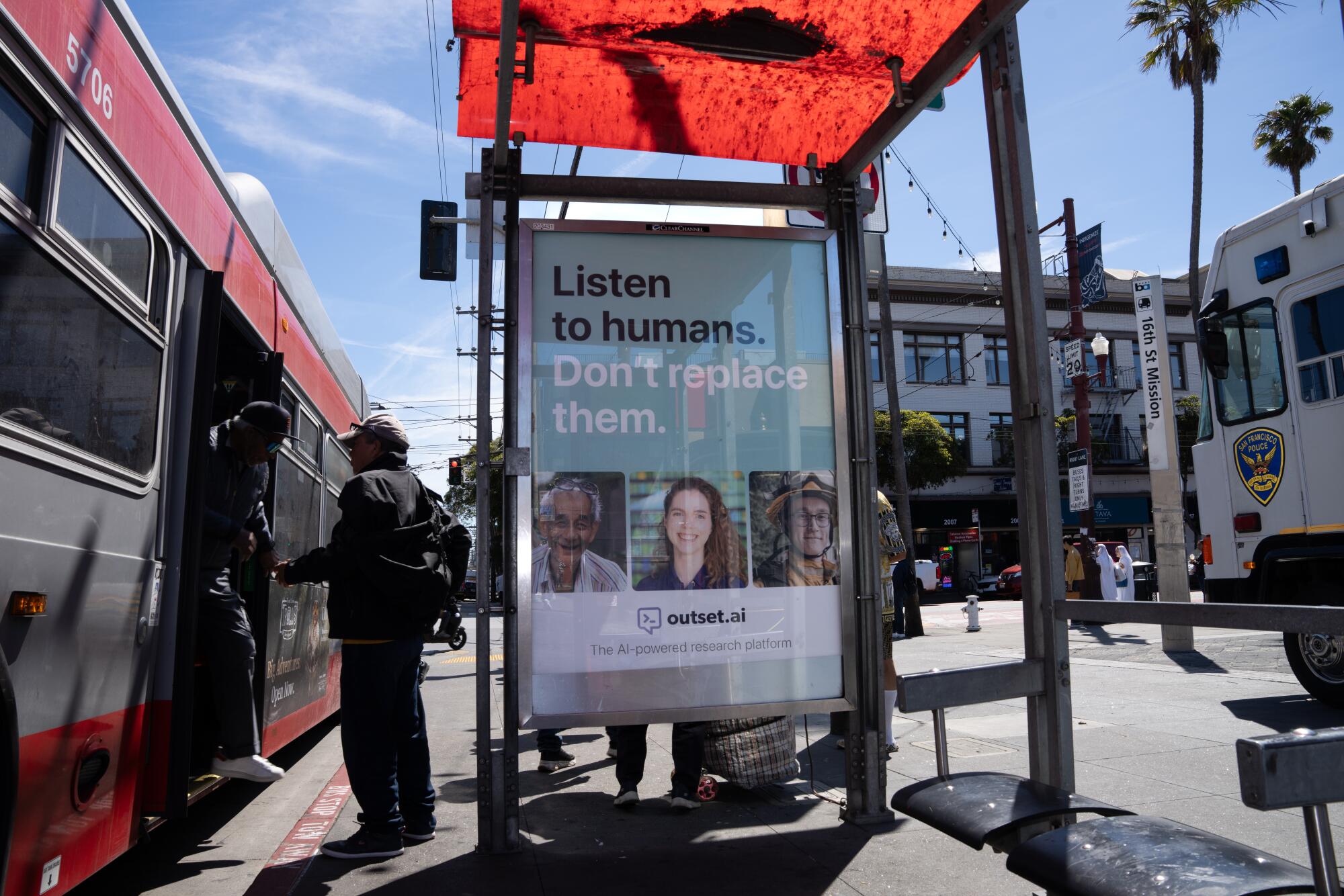 A bus stop advertises Outset, an AI software company, in the Mission District in San Francisco.