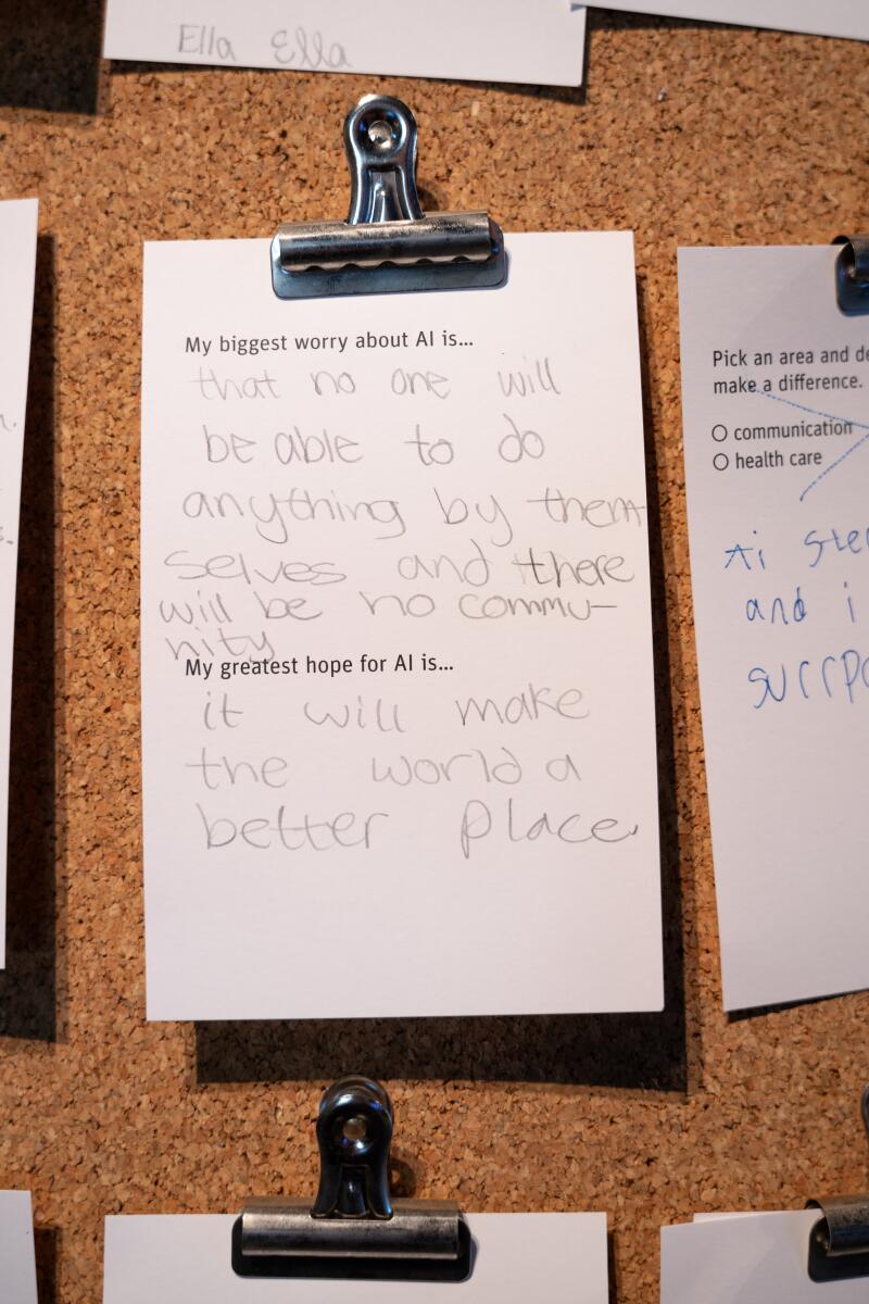 Notes written by people visiting the Exploratorium's "Adventures in AI" exhibition list their greatest worries and hopes