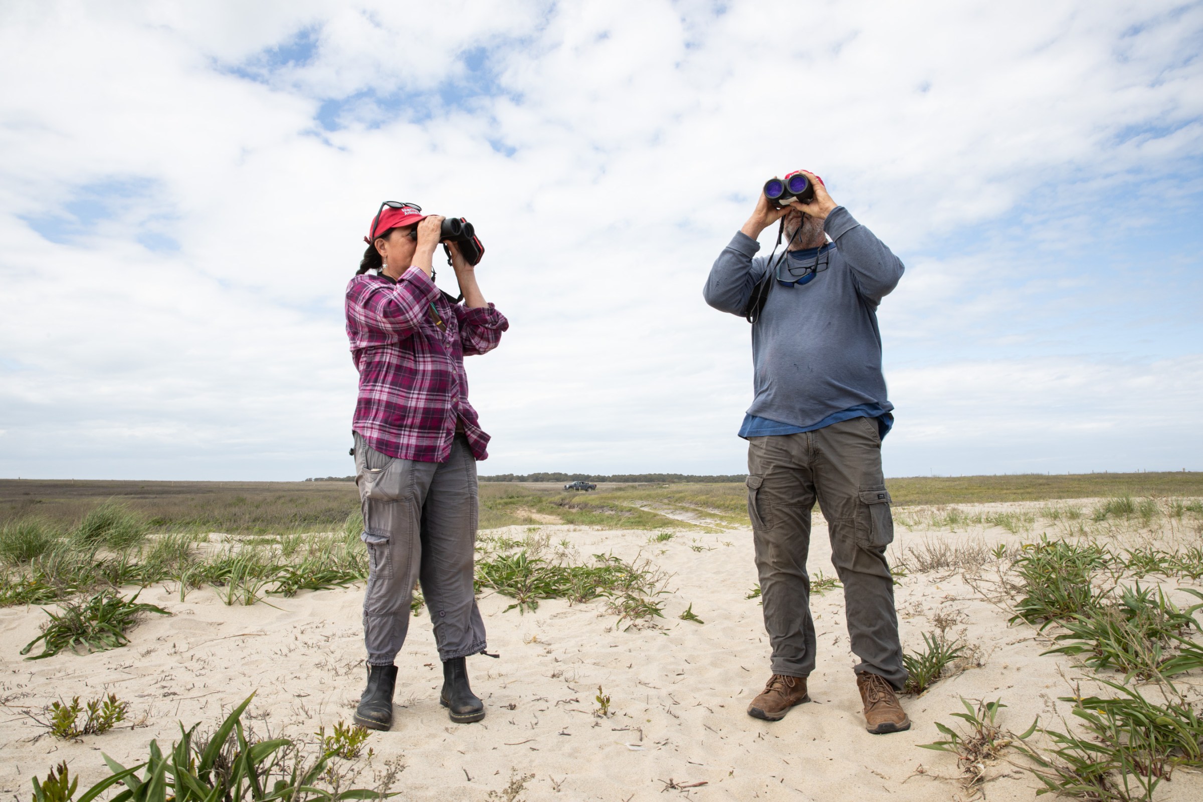 Rain Harbison, left, and Blair Perkins at the Coskata-Coatue Wildlife Refuge in Nantucket, where they conduct daily beach patrols for animals in distress. Though they have individually patrolled the beach for many years, their organization Nantucket Animal Rescue became an official nonprofit in December of 2024 and includes a network of volunteers who are dedicated to wildlife rescue and conservation.