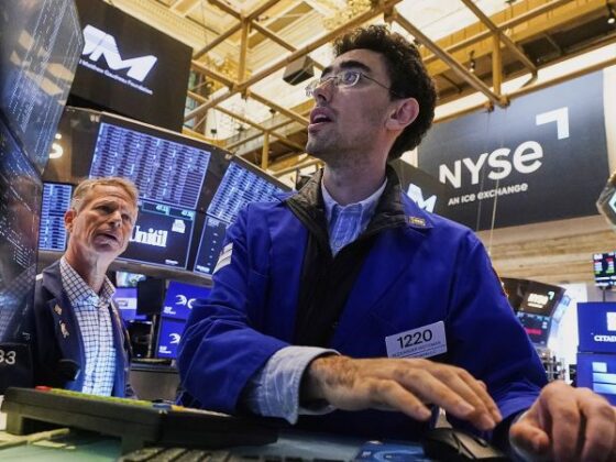 Dow soars 800 points and hits record high as Powell hints at rate cut