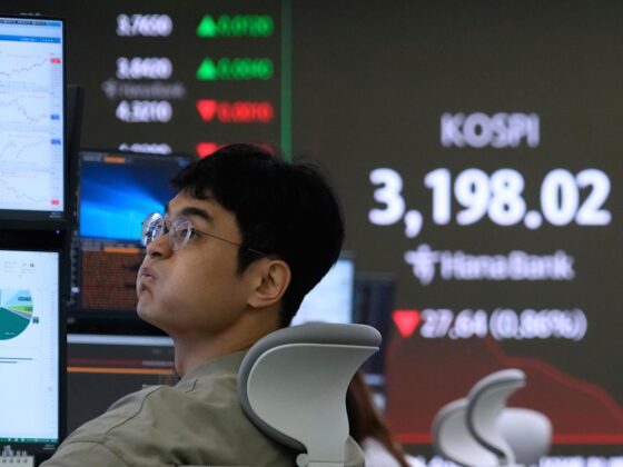 Asian shares mostly gain as eyes turn to meetings at the White House and Jackson Hole
