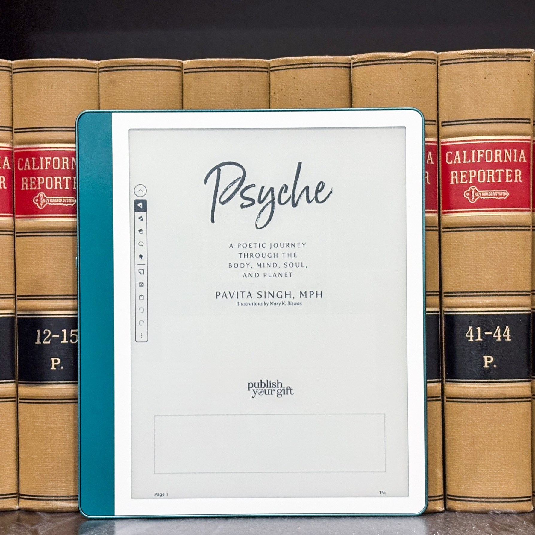 The Kindle Scribe in front of a bunch of books sitting on a shelf.