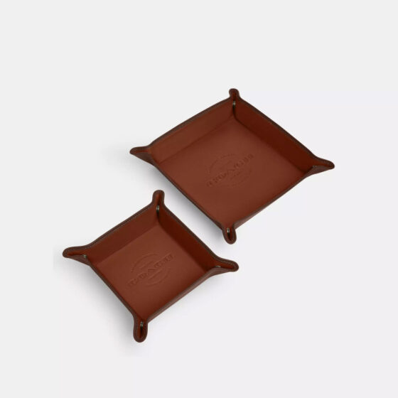 Coach Outlet is selling a 0 set of 'quality' leather valet trays for only 