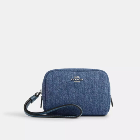 Coach Outlet's 'cute' pouch wristlet is now just , thanks to a rare double discount