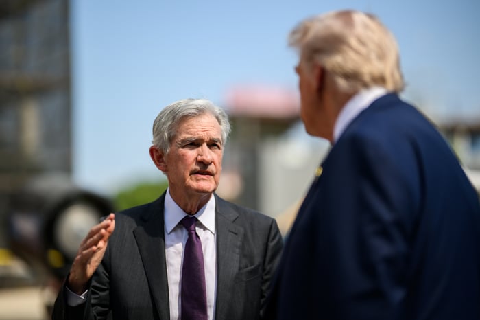 Fed Chair Jerome Powell speaking with Donald Trump during a Fed headquarters tour.