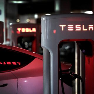 Dow falls 600 points, Tesla Europe sales, T. Rowe Price earnings