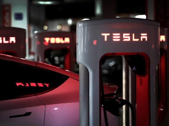 Dow falls 600 points, Tesla Europe sales, T. Rowe Price earnings
