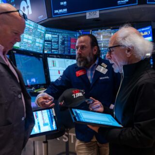 Dow falls more than 500 points on jobs report, tariffs