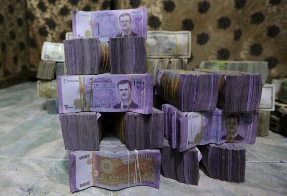 Exclusive-Syria to revalue currency, dropping two zeros in bid for stability