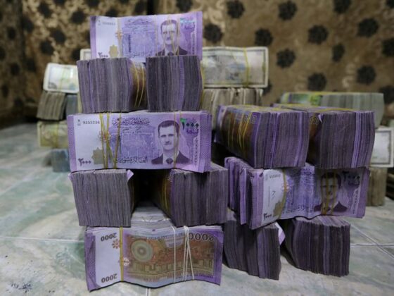 Exclusive-Syria to revalue currency, dropping two zeros in bid for stability