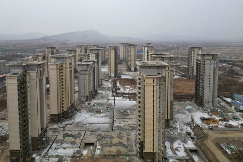 From $50 billion to bust, investors count cost of Evergrande's market tryst