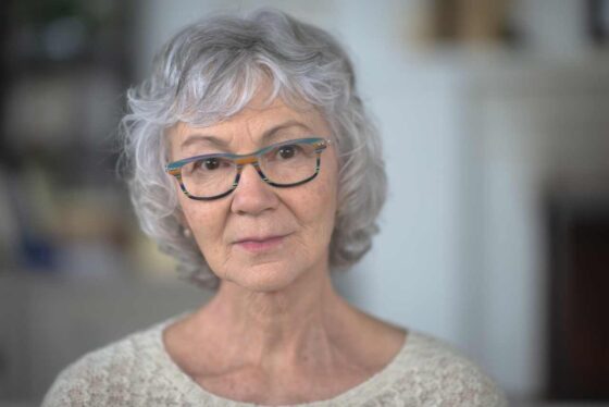 I am a 65-year old single woman with 25 credit cards. How do I cancel them without hurting my credit score?