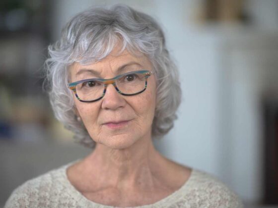 I am a 65-year old single woman with 25 credit cards. How do I cancel them without hurting my credit score?