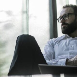 I’ve been laid off 3 months shy of retirement. I’ll get 6 months severance — if I don’t sue. What should I do?