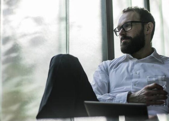 I’ve been laid off 3 months shy of retirement. I’ll get 6 months severance — if I don’t sue. What should I do?