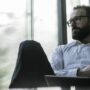 I’ve been laid off 3 months shy of retirement. I’ll get 6 months severance — if I don’t sue. What should I do?