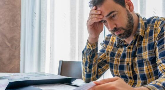 Should I sell my vacation home that I dream of living in when I retire to pay off K in credit card debt?