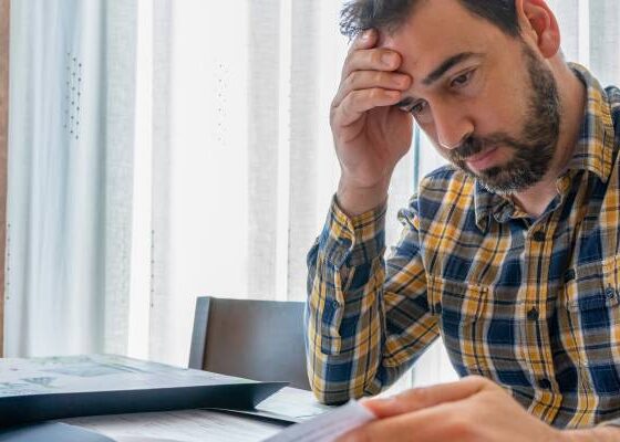 Should I sell my vacation home that I dream of living in when I retire to pay off K in credit card debt?