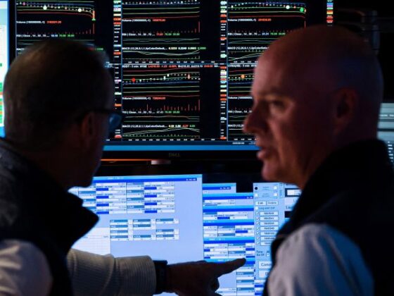 Wall Street closes out a wild month on a subdued note