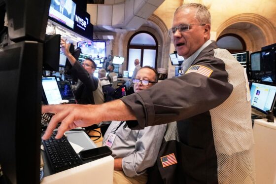 Wall Street soars on hopes for lower interest rates as the Dow surges 846 points to a record