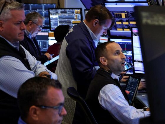 Walmart weighs on Dow, Sarepta debt restructuring