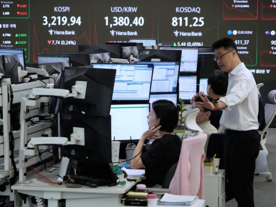 World shares are mixed as Tokyo’s Nikkei jumps nearly 2% on tariff news