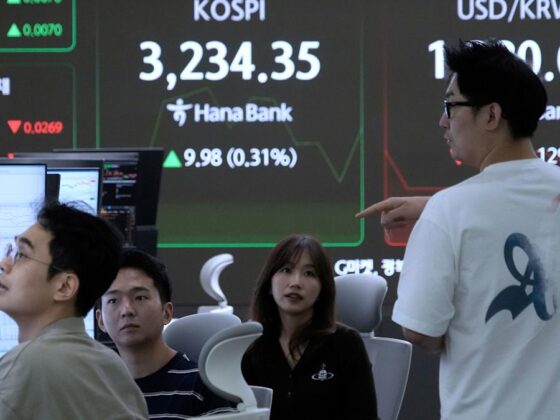 World shares mixed ahead of meeting between Trump and Putin